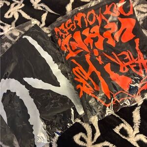 Two Extra large men’s The Weeknd shirts never worn still in original packaging